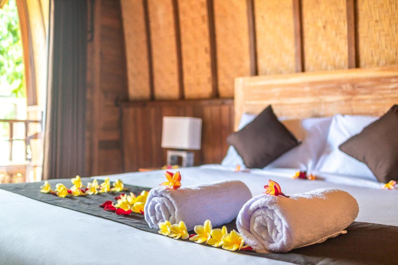 Wooden Puri Guesthouse Улувату Екстер'єр фото