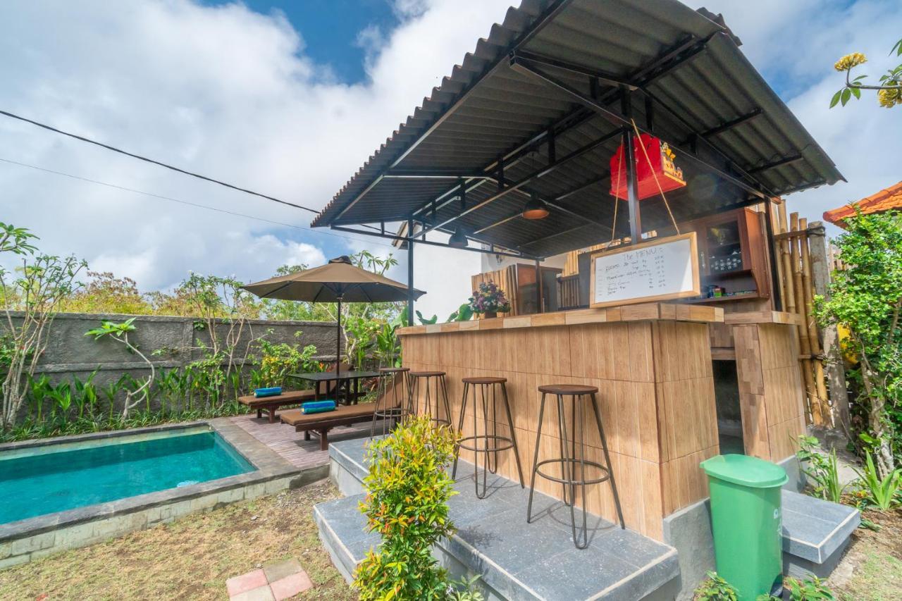 Wooden Puri Guesthouse Улувату Екстер'єр фото